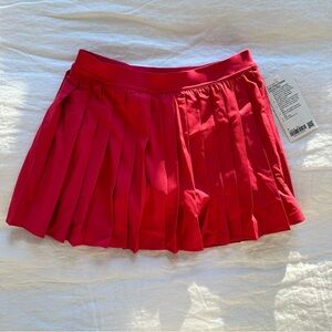 Lululemon HR Pleated Tennis Skirt in Cherry Mist / Cerise